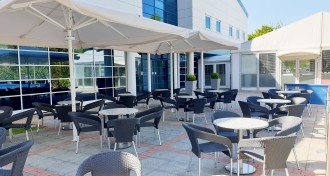 Parasol and Chairs on the Patio at The Ark Conference Centre