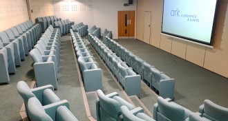 View of Upper Squire with it&#039;s theatre seating and widescreen projector at The Ark Conference Centre in Basingstoke Hampshire